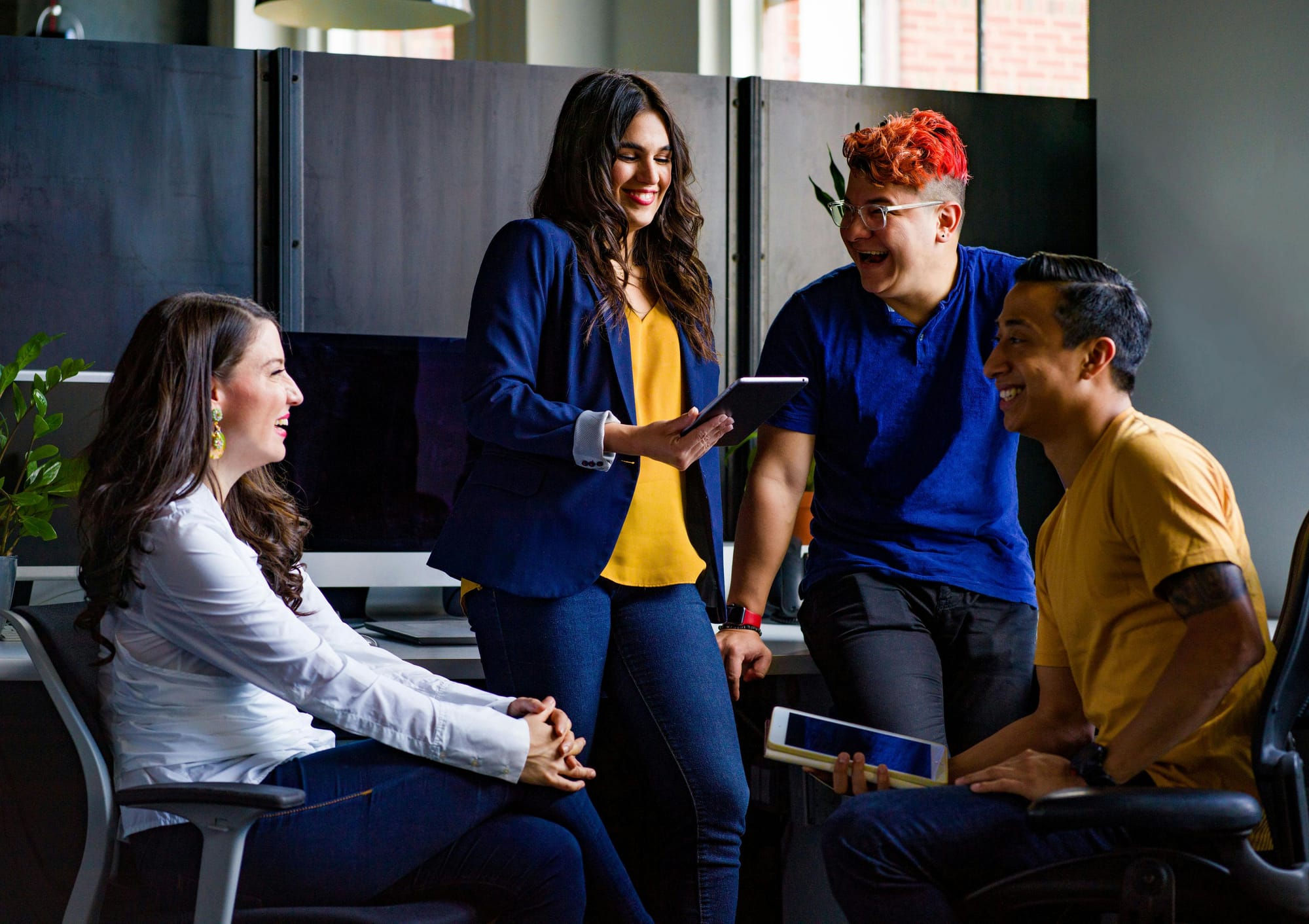Team talking to each other in an office